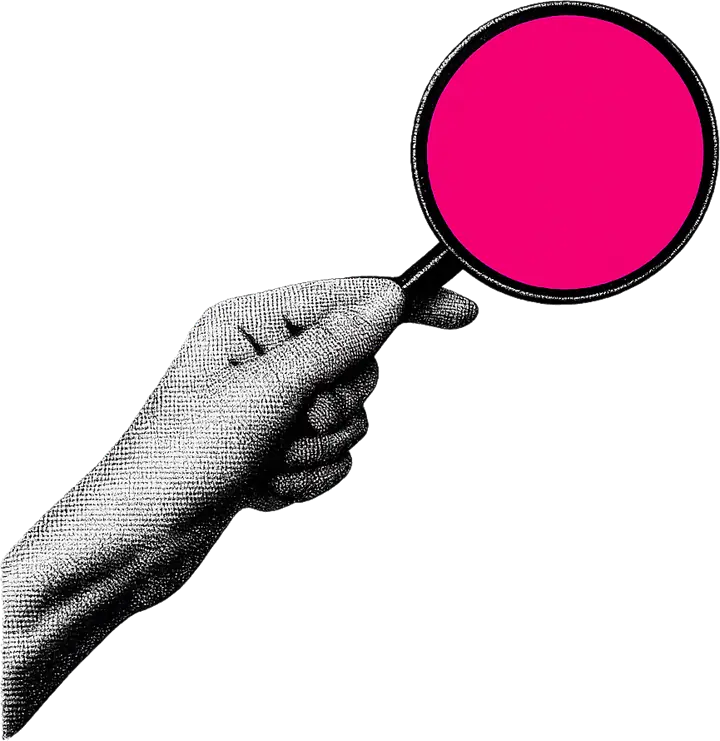 Una mano regge una lente d'ingrandimento