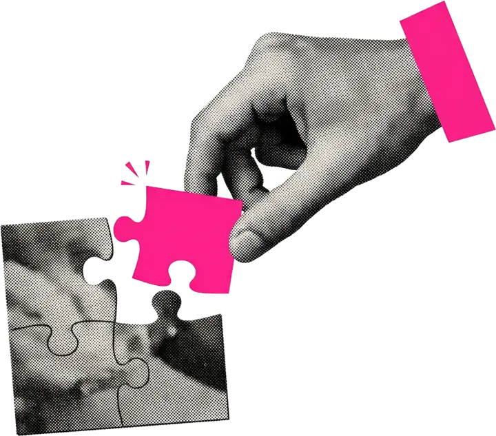 Una mano mette l'ultimo pezzo di un puzzle